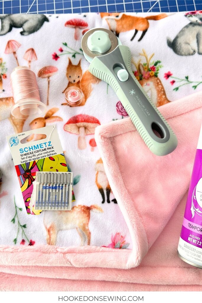 pastel forest animals on a white background Cuddle minky fabric with a walking foot, stretch needle, rotary cutter, polyester thread and adhesive spray